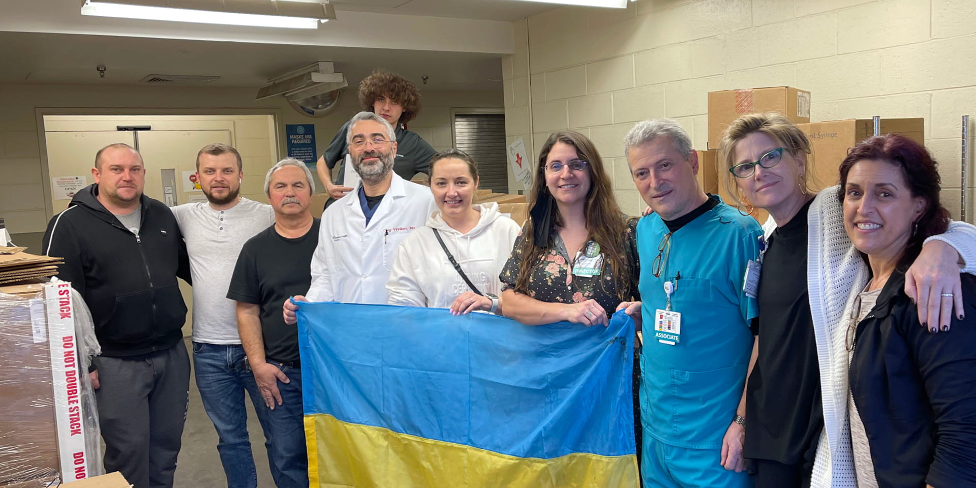 Doylestown Health staff holding Ukranian flag