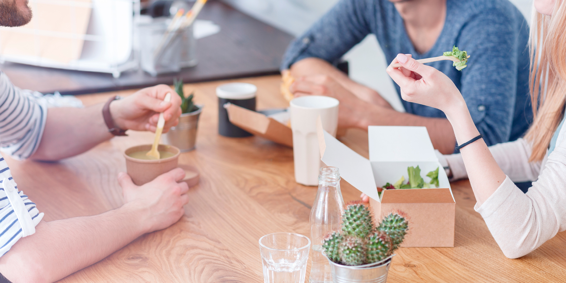 employees in the break room eating healthy meals