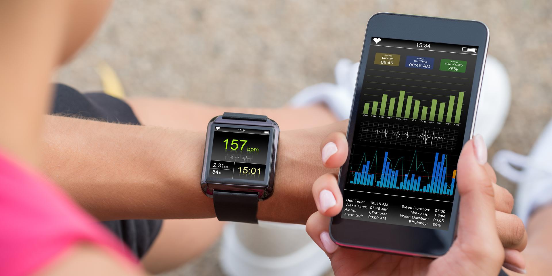 Woman syncing watch with phone