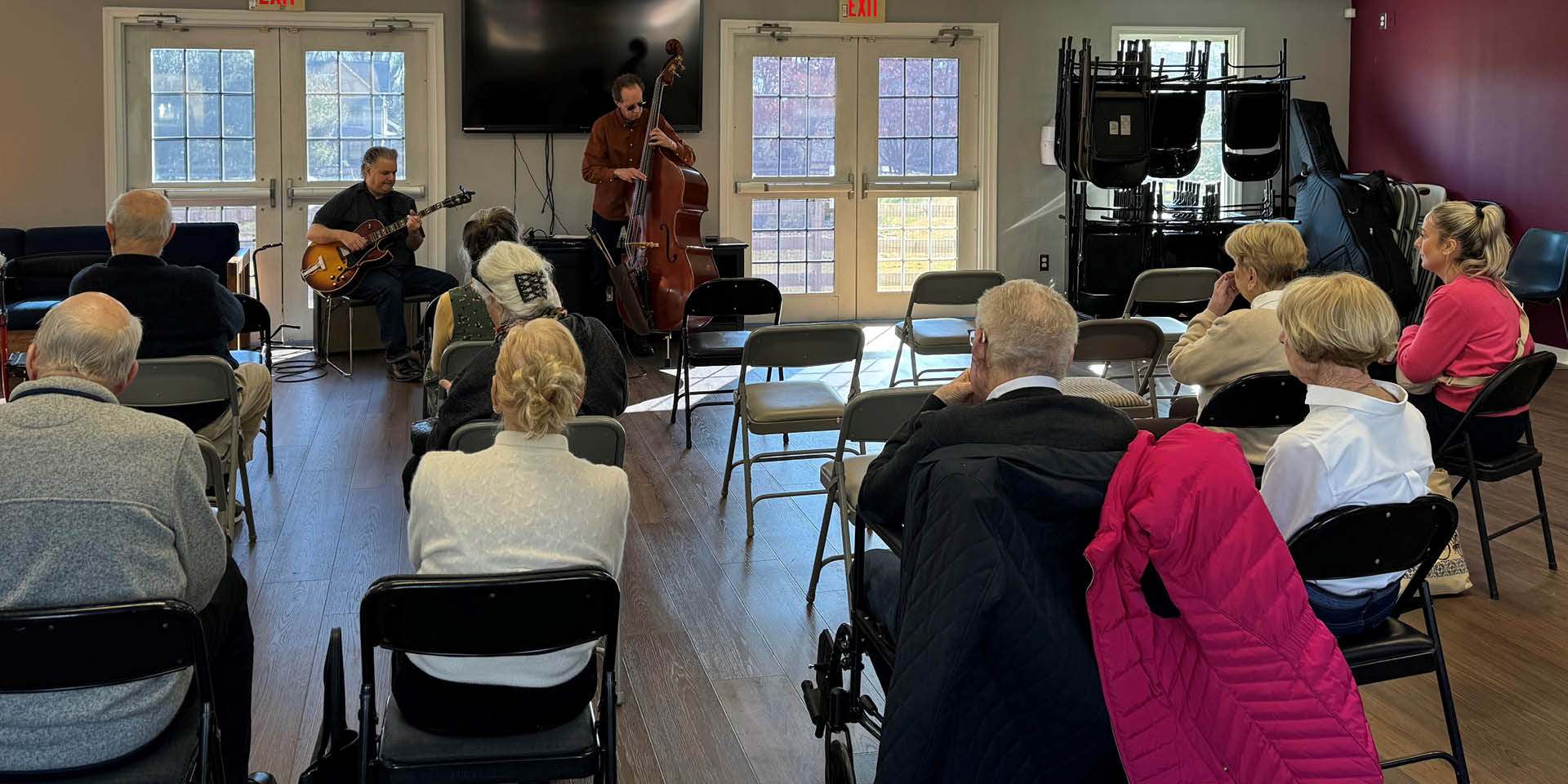 Audience listing to musicians at Memory Cafe | Doylestown Health