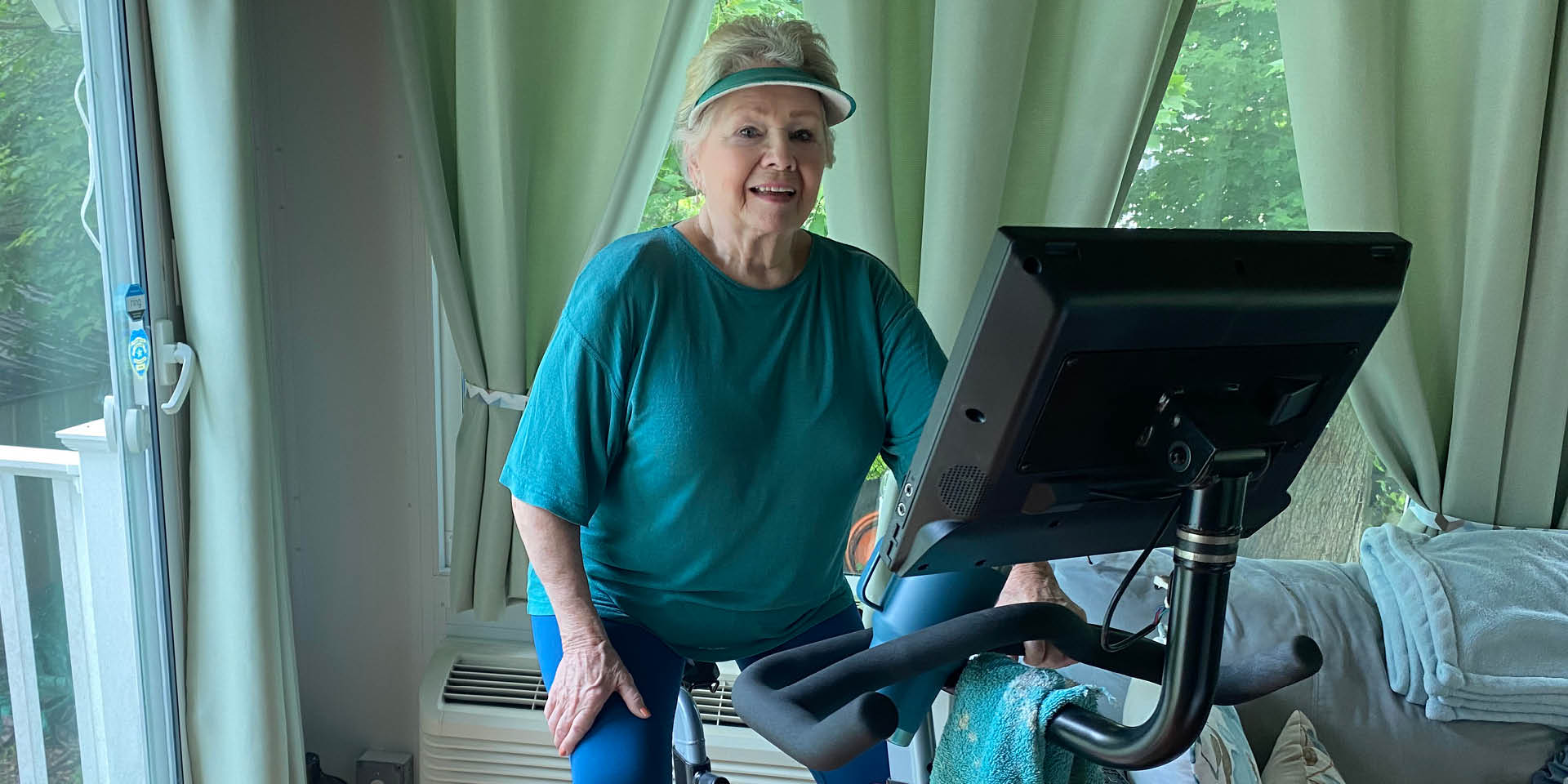Ellen on her exercise bike | Doylestown Health
