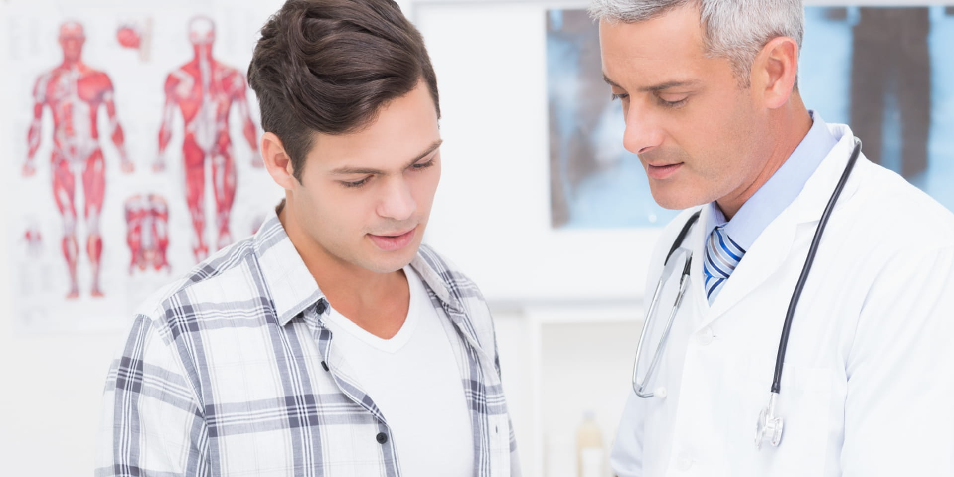 AS doctor and patient discussing testicular cancer | Doylestown Health