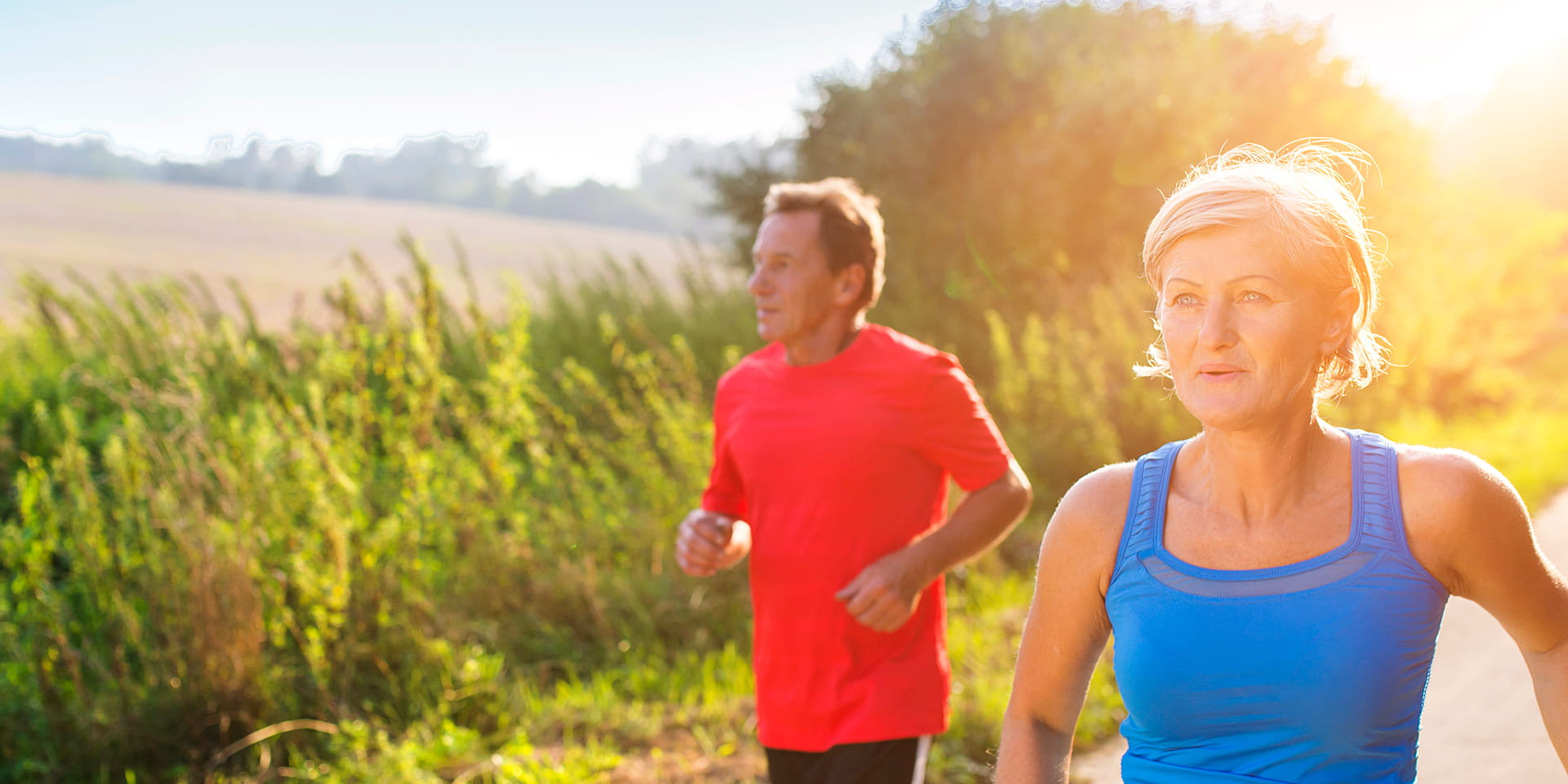 A man and a woman running for a 5K | Doylestown Health