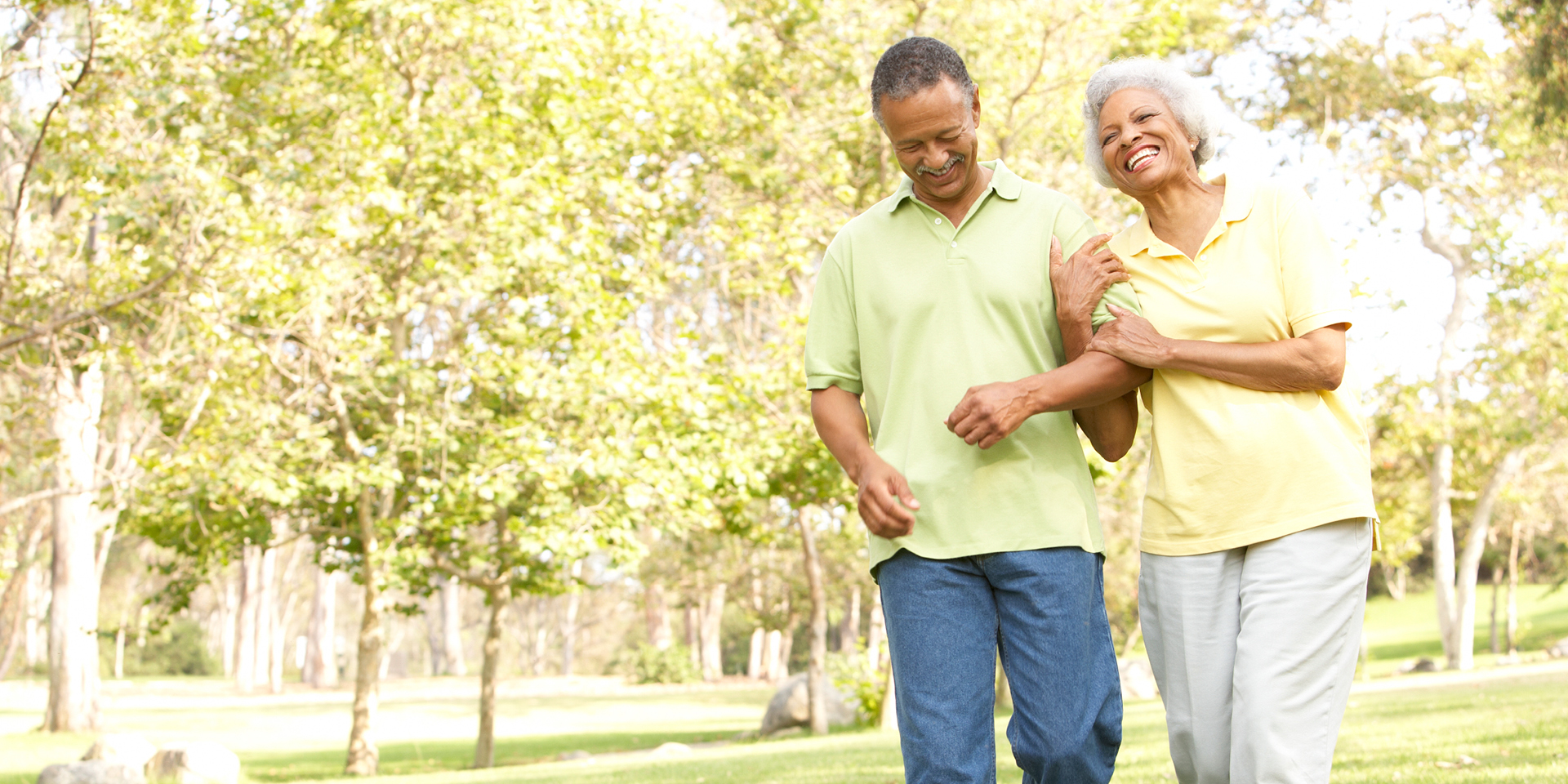 Couple walking in the park on a sunny day | Doylestown Health