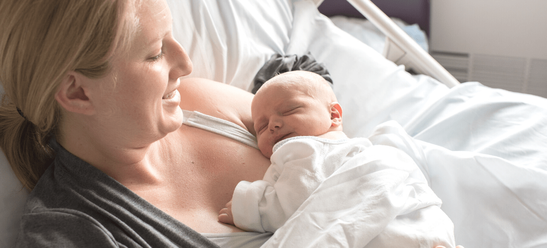 Mother holding a newborn | Doylestown Health